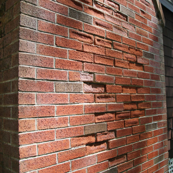 Crumbling brick on a historic Dorchester home needing masonry repair