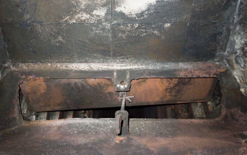 rusted damper in chimney at Dorchester home